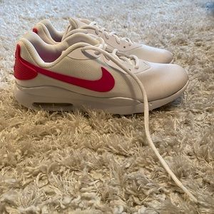 Pink and white Nikes